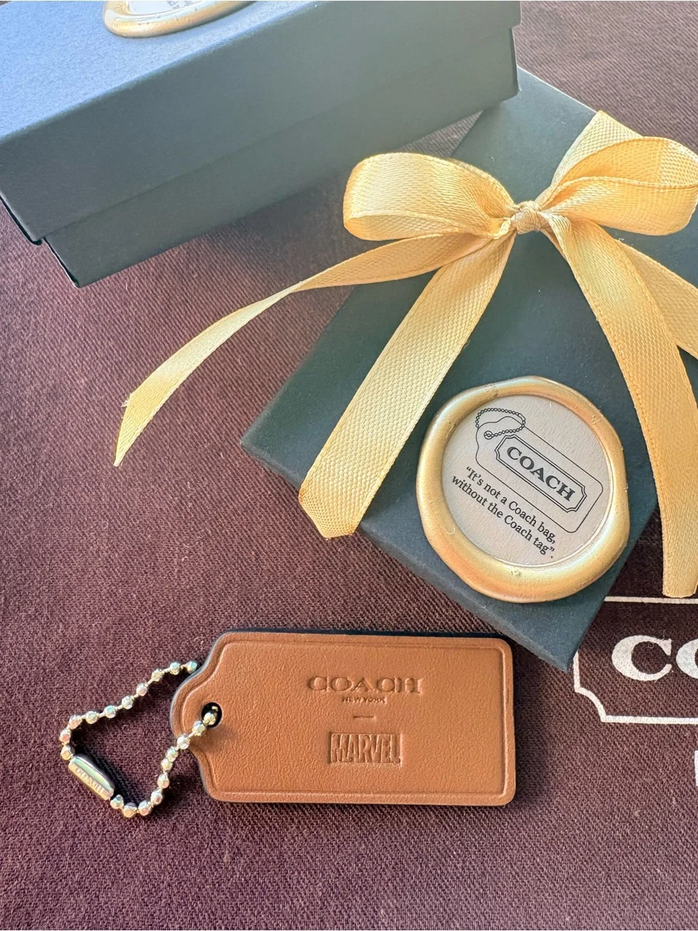 🦸♀️ Coach x MARVEL Ltd Ed Saddle Brown Leather HangTag Bag Charm | 2.375” - Picture 7 of 7